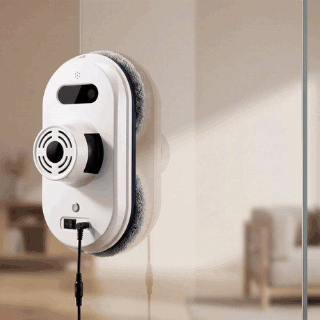 Étape 1 — Posez le robot Anti-Chute sur la vitre et appuyez sur le bouton pour démarrer