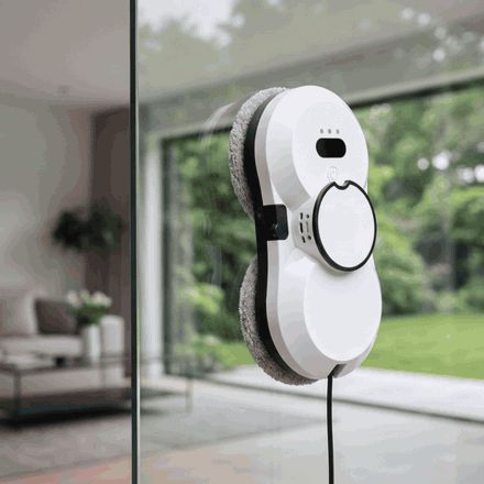 Étape 1 — Posez le robot à Pulvérisation sur la vitre, il adhère seul